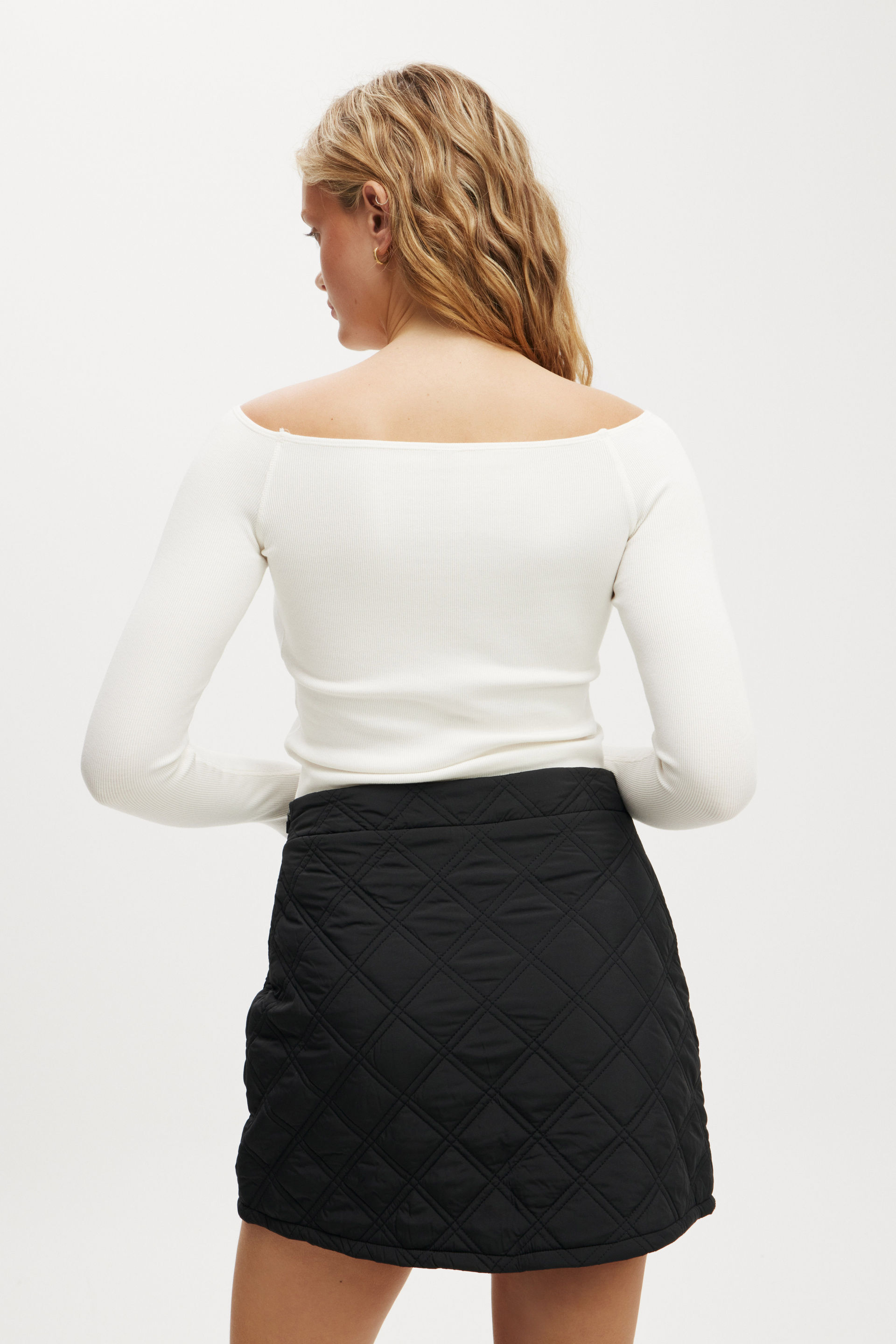 11665-rhythm-quilted-puffer-mini-skirt-black-1.jpg
