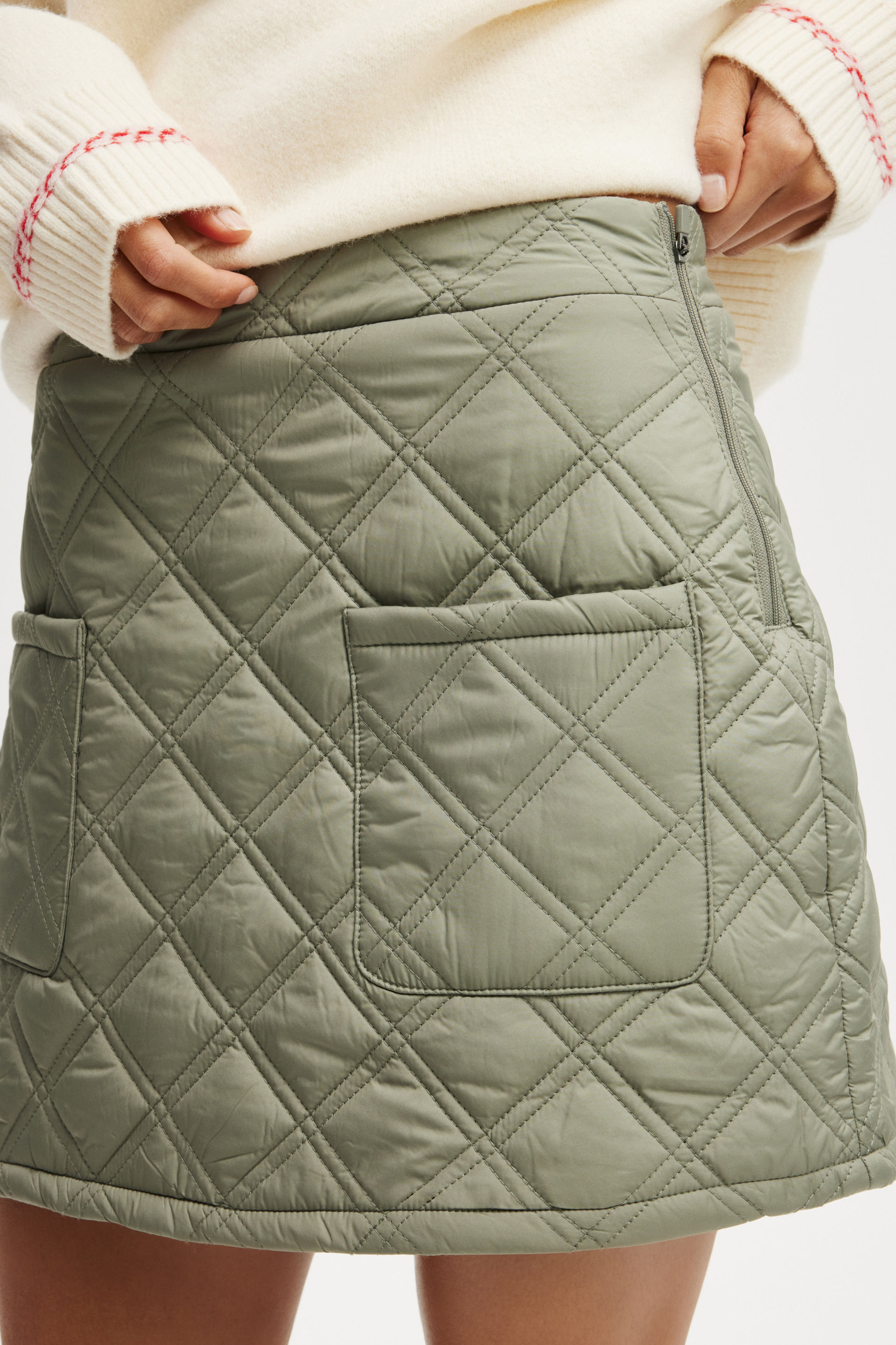 11666-rhythm-quilted-puffer-mini-skirt-dusty-khaki-1.jpg