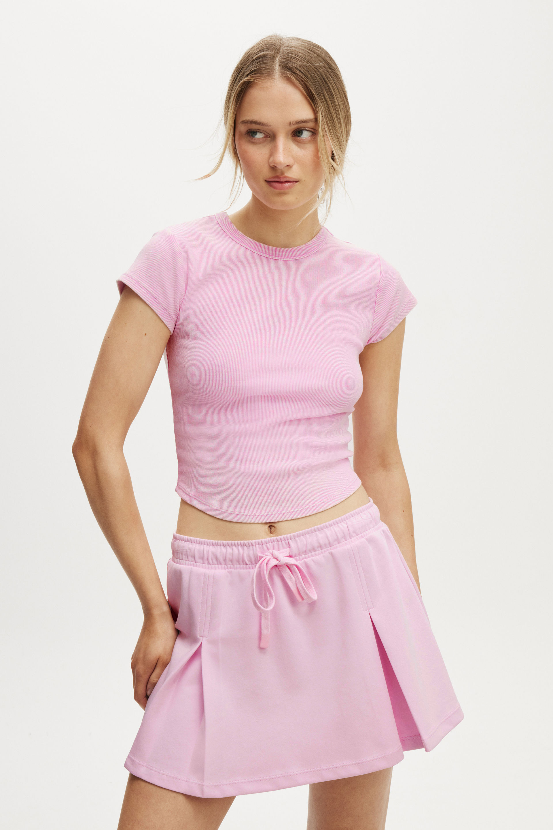 13216-active-curved-hem-baby-tee-washed-pink-lavender-1.jpg