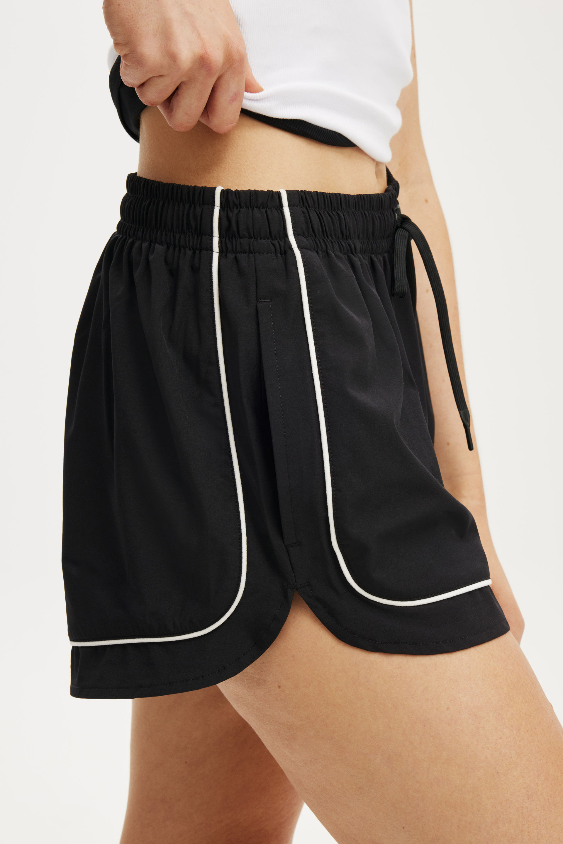 13744-woven-curved-hem-short-black-1.jpg