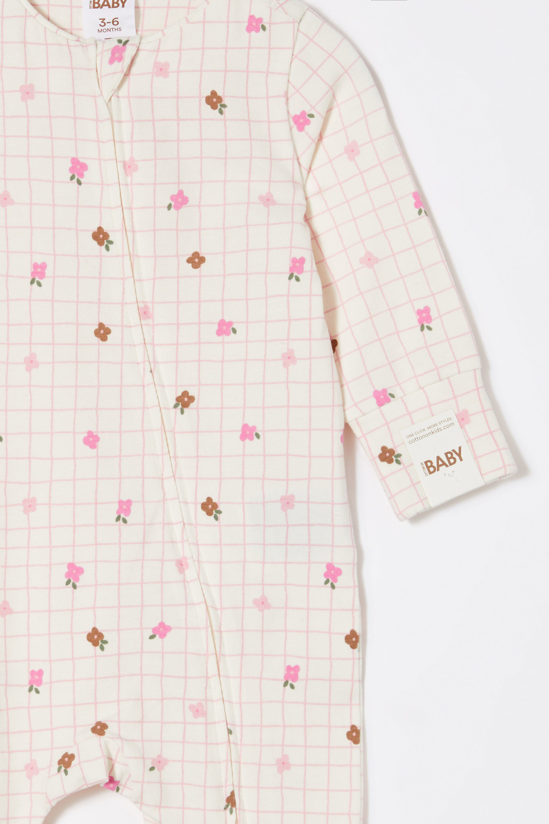 16140-the-billie-long-sleeve-zip-romper-vanilla-grid-flower-1.jpg