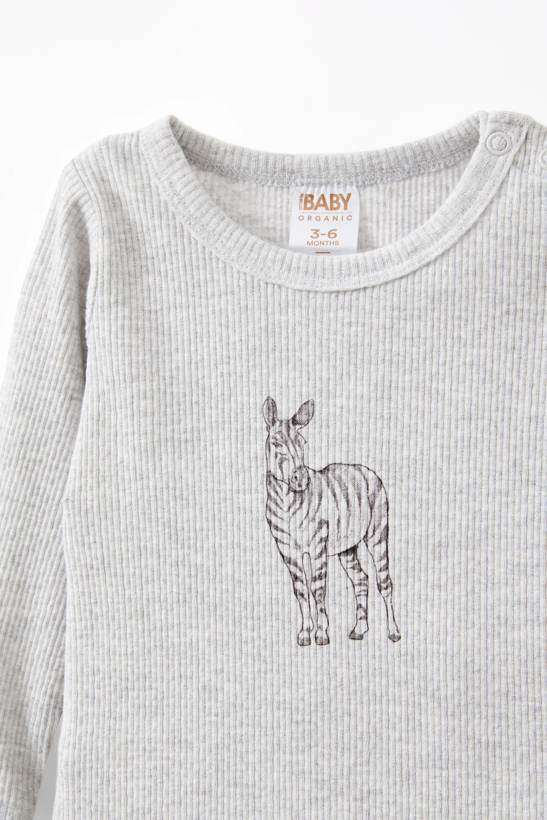 16898-organic-pointelle-long-sleeve-bubbysuit-cloud-marle-ziggy-zebra-1.jpg
