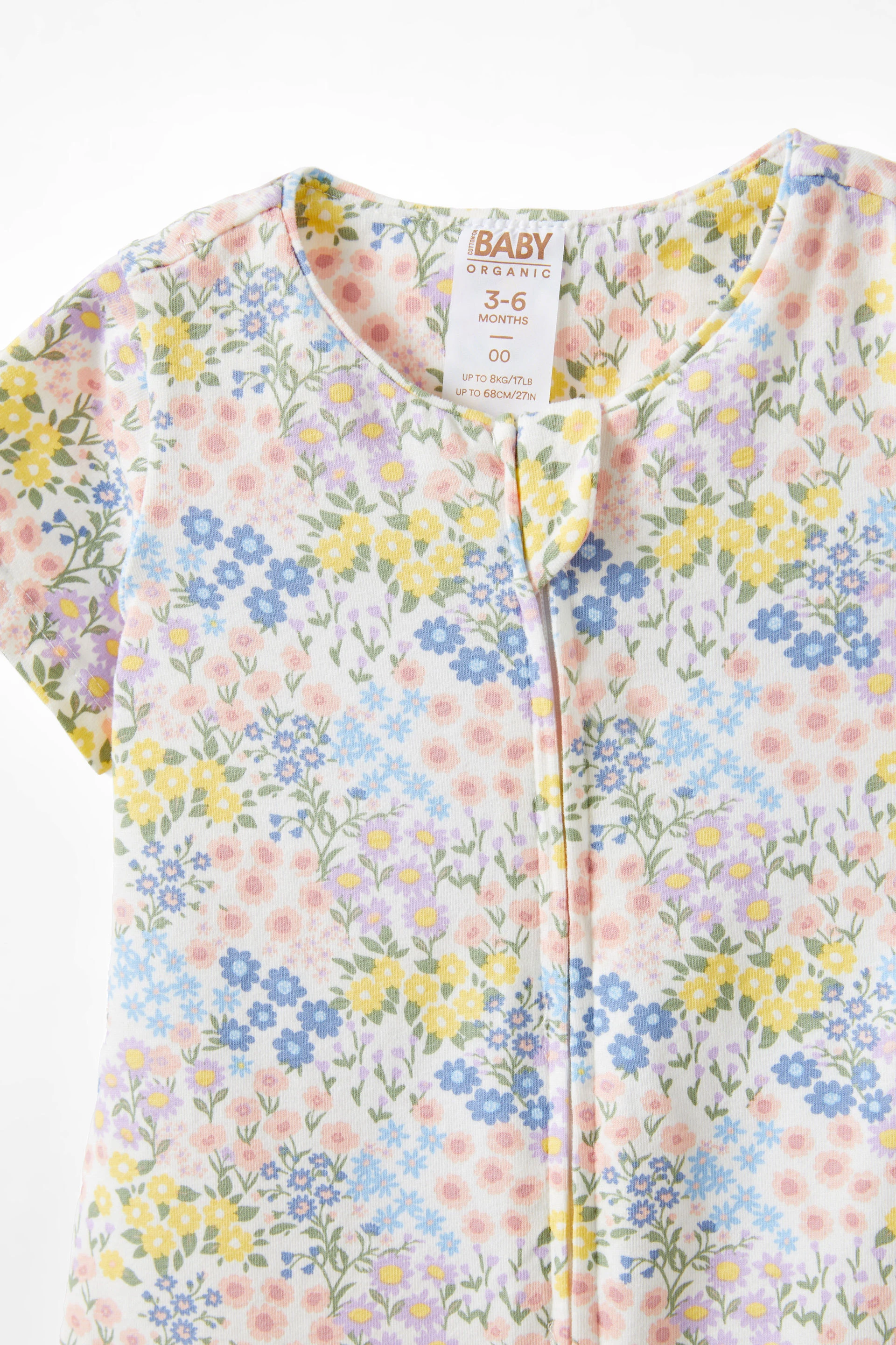 17183-the-billie-short-sleeve-zip-romper-vanilla-mimi-ditsy-1.jpg