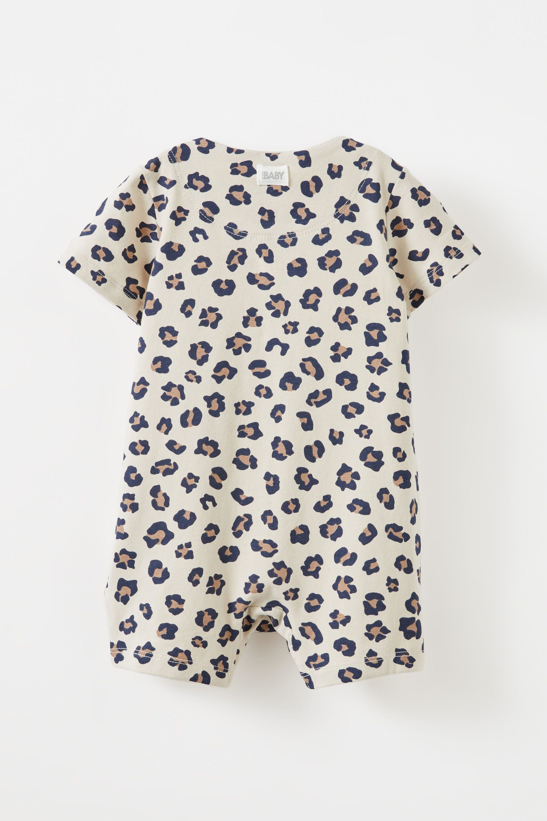 17200-the-billie-short-sleeve-zip-romper-rainy-day-animal-spots-1.jpg