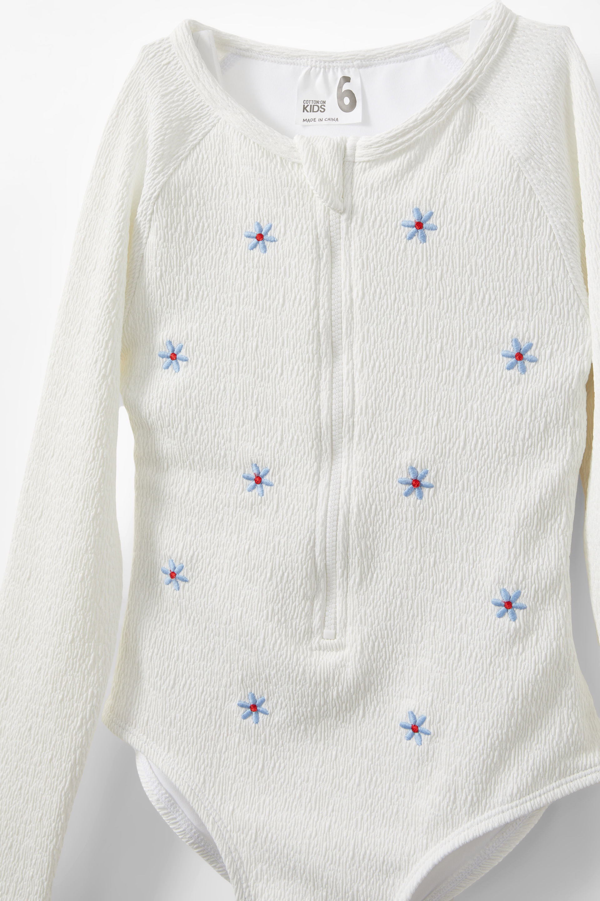19915-lydia-low-one-piece-vanilla-crinkle-embroidered-floral-1.jpg