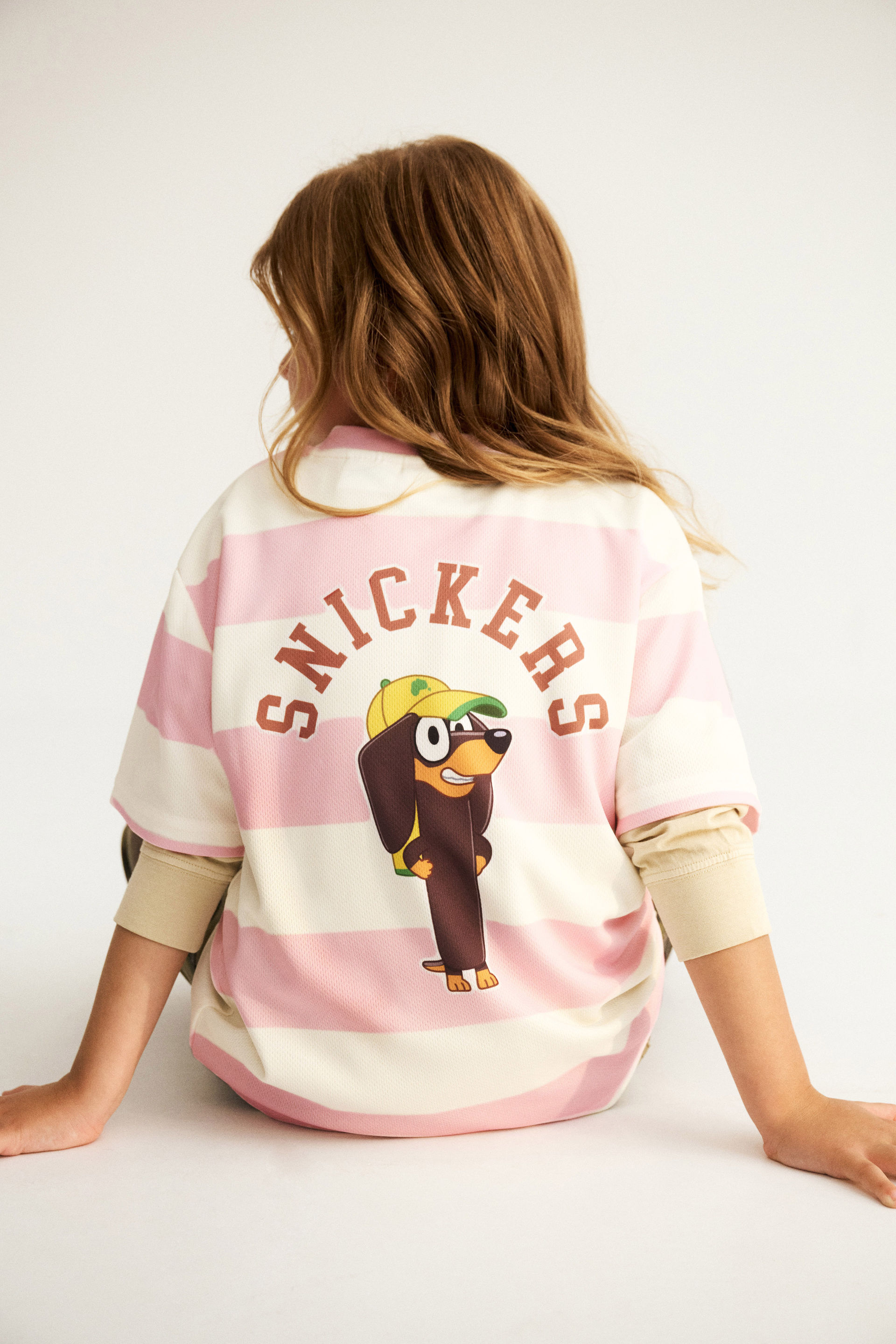 20904-bluey-soccer-top-lcn-bluey-snickers-tea-party-pink-1.jpg