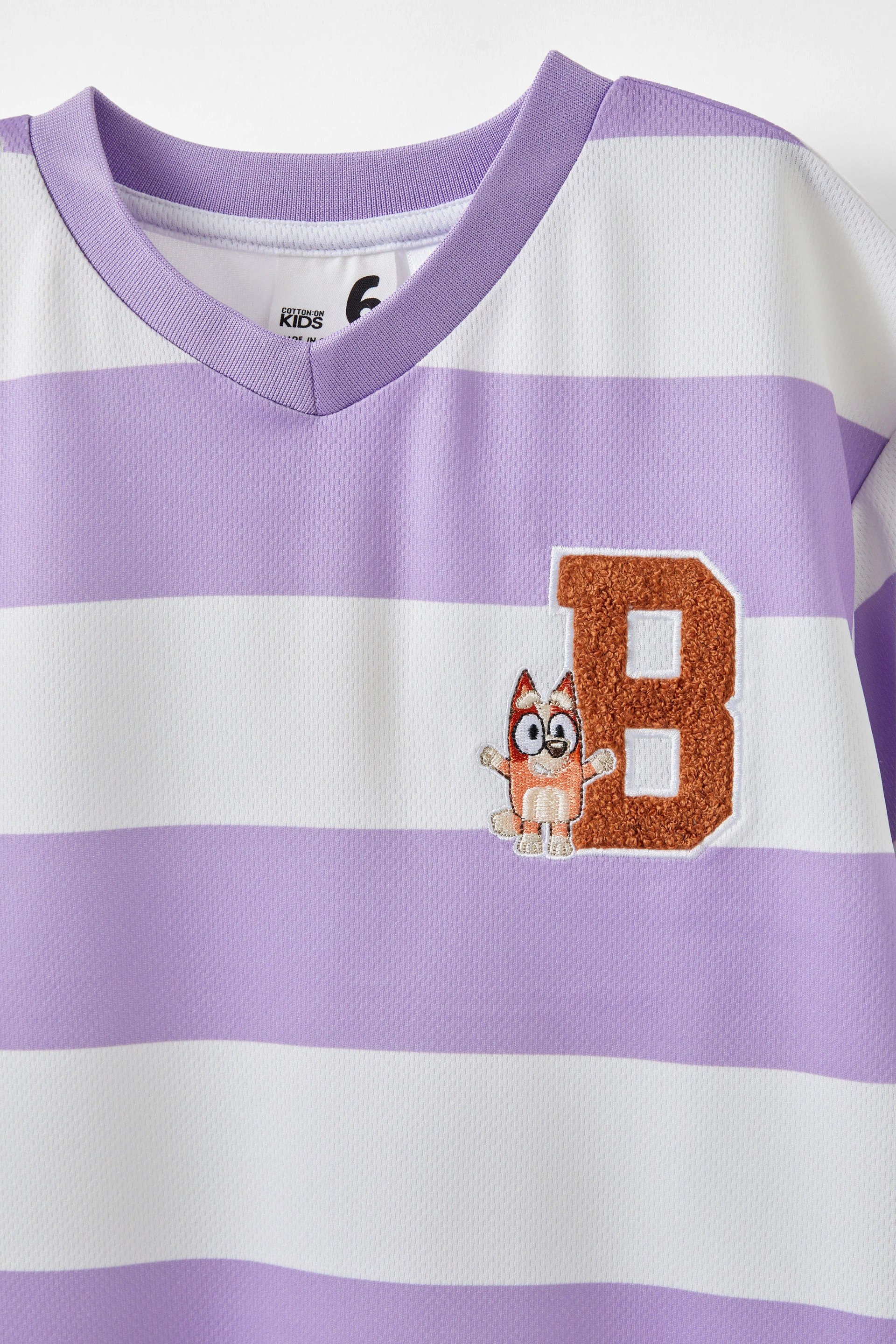 20905-bluey-soccer-top-lcn-bluey-bingo-lilac-mood-1.jpg