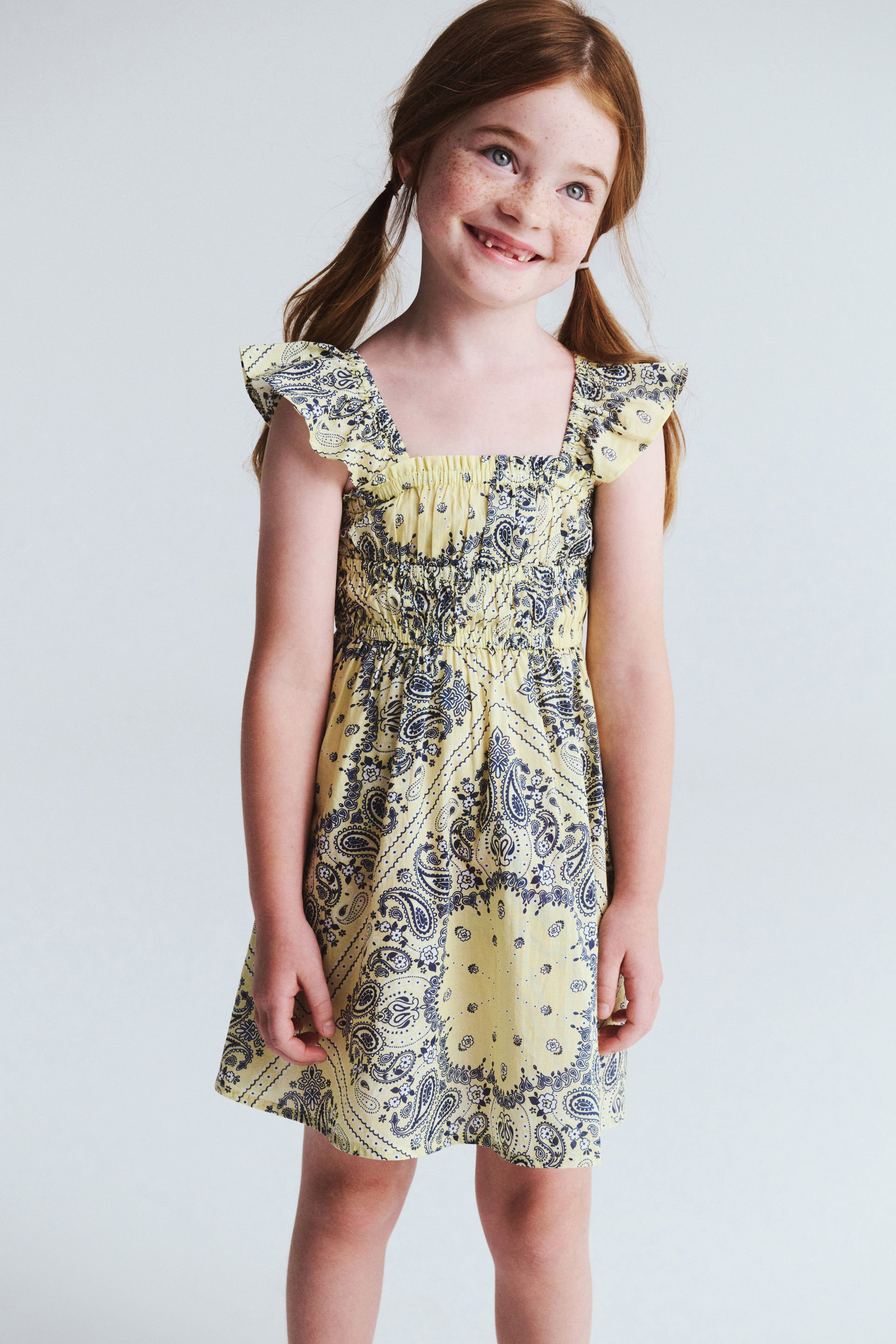 20987-frankie-flutter-sleeve-dress-baby-yellow-bandana-paisley-1.jpg
