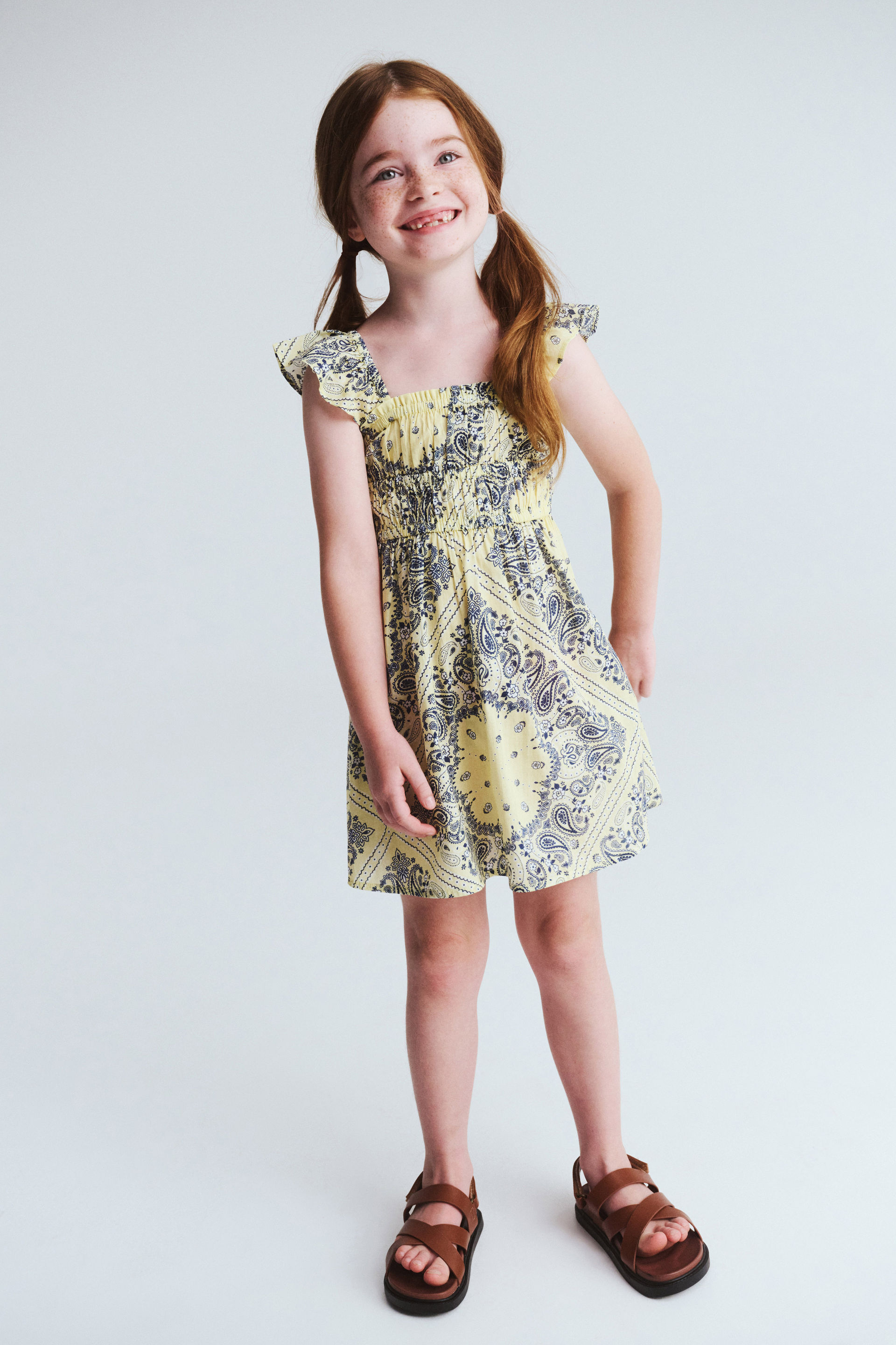 20987-frankie-flutter-sleeve-dress-baby-yellow-bandana-paisley-1.jpg
