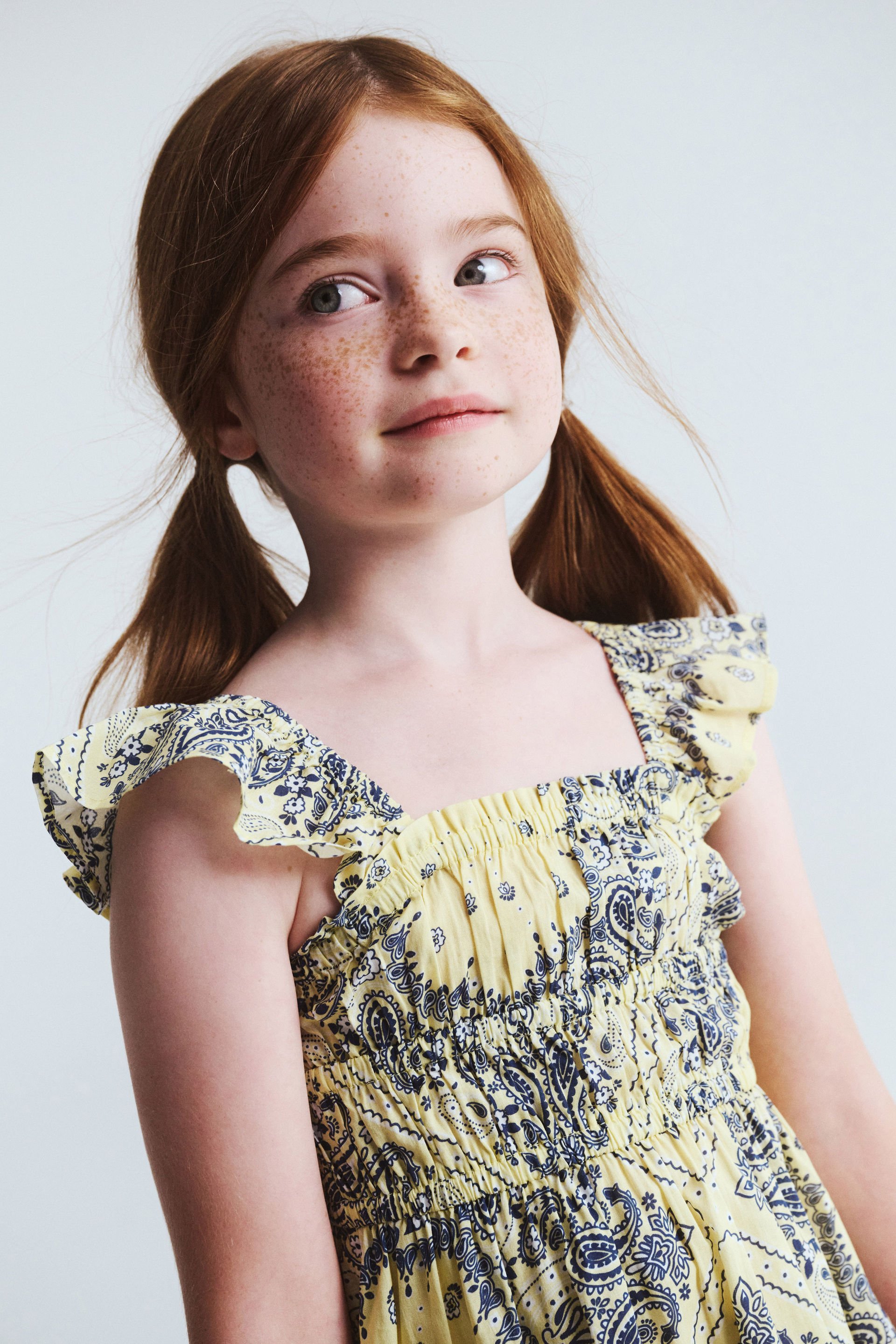 20987-frankie-flutter-sleeve-dress-baby-yellow-bandana-paisley-1.jpg