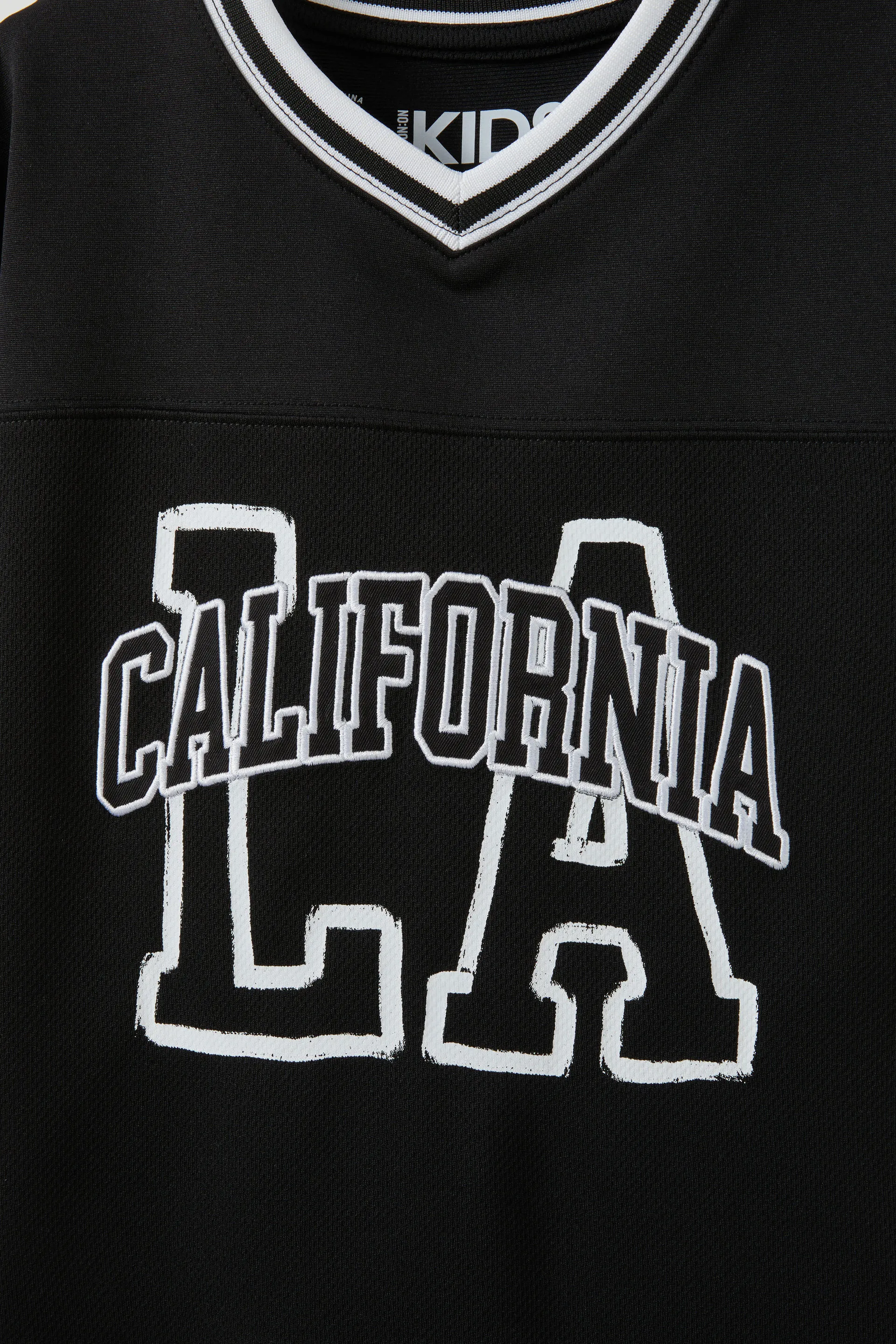 22096-short-sleeve-sport-v-neck-tee-black-california-1.jpg