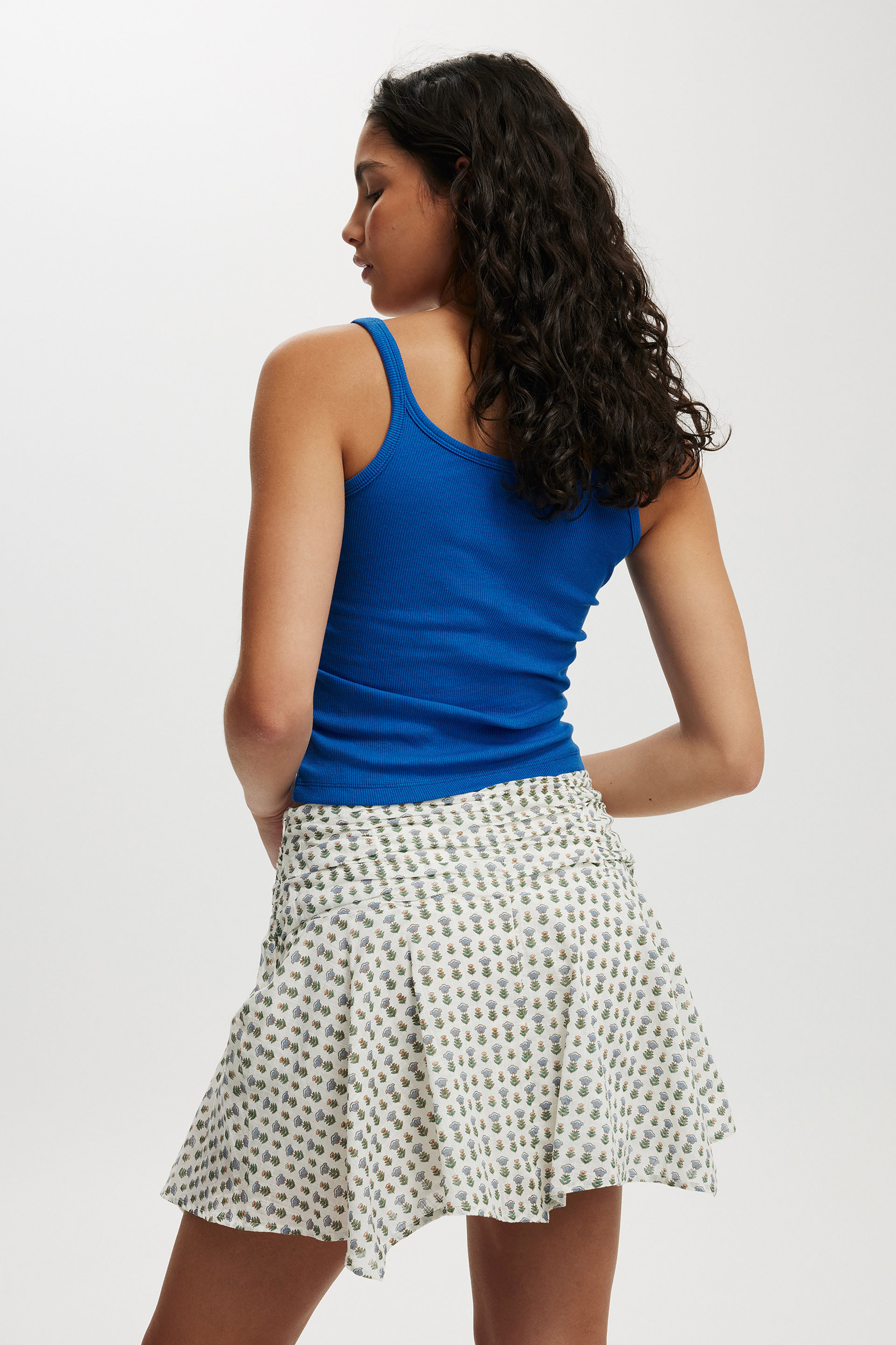 2500-georgie-hanky-hem-mini-skirt-hannah-floral-white-1.jpg