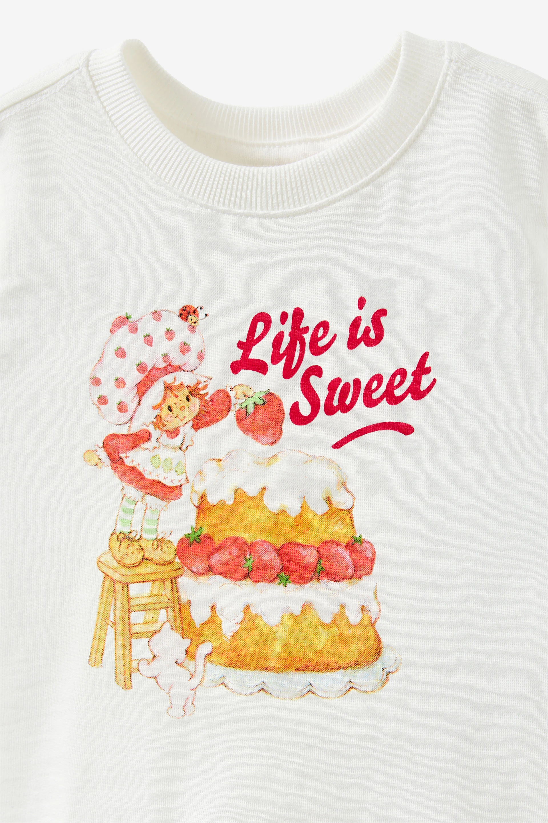 25443-strawberry-shortcake-short-sleeve-graphic-print-tee-lcn-ssc-vanilla-strawberry-shortcake-1.jpg