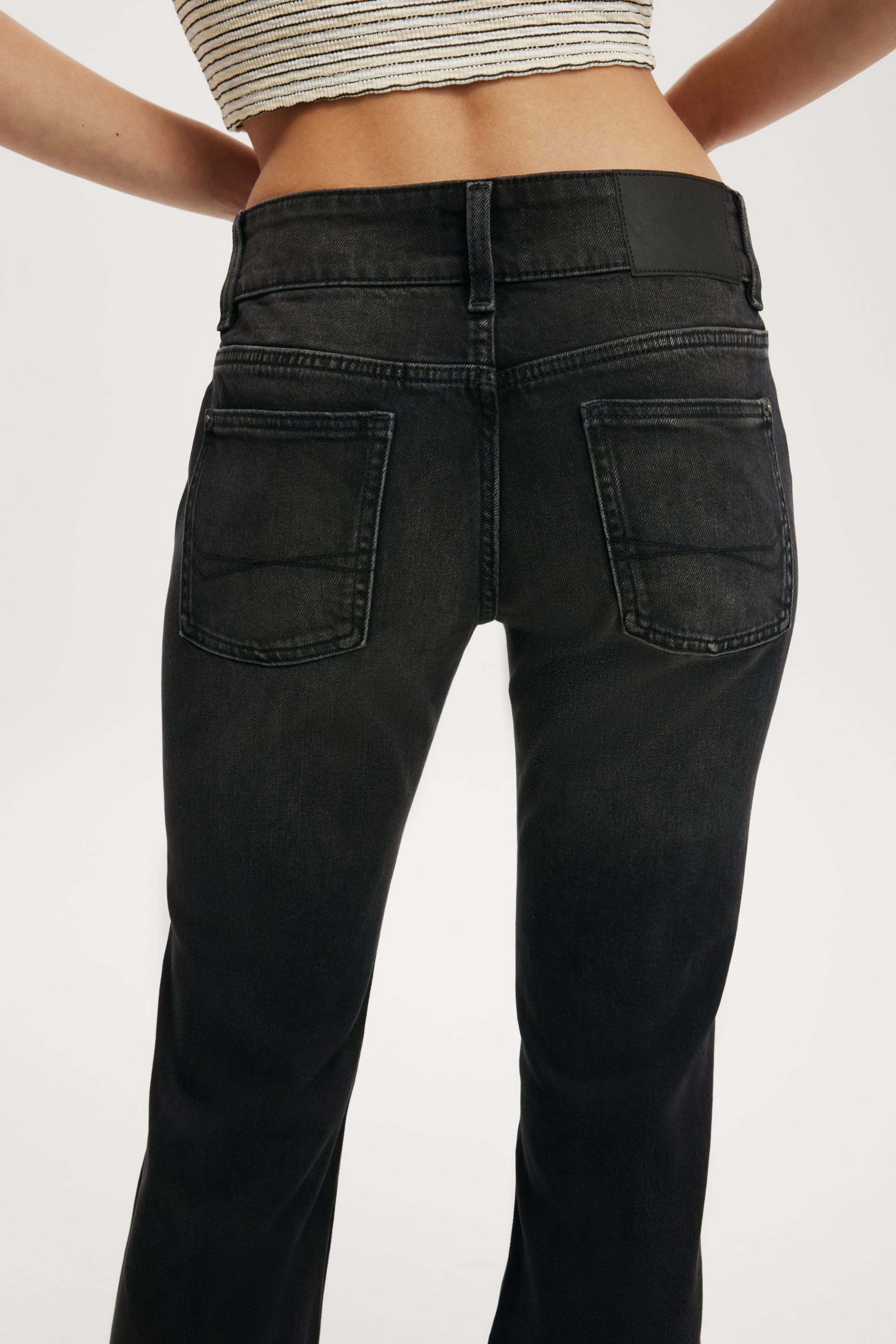 3526-low-rise-bootcut-jean-stitch-revolve-black-1.jpg