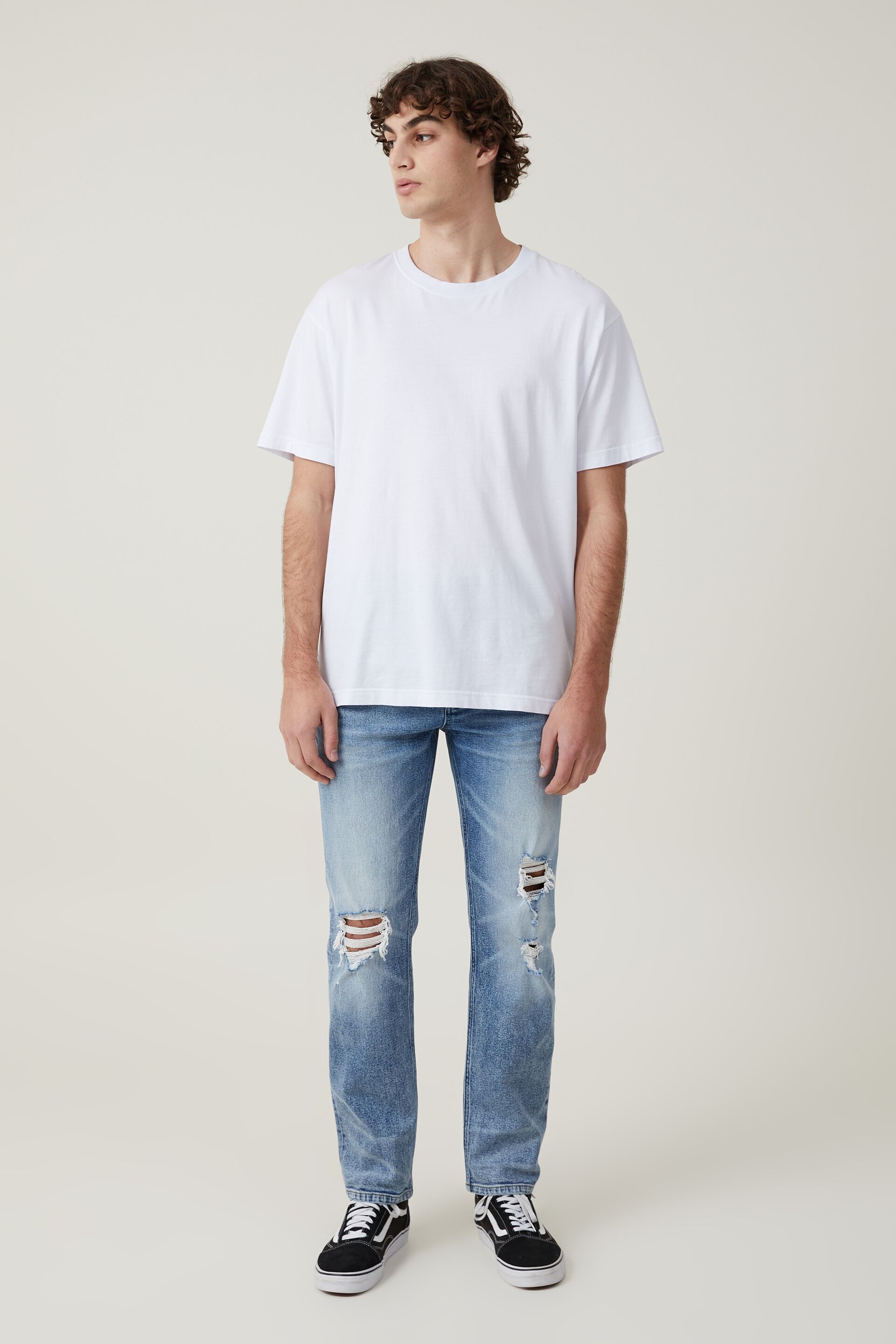 Slim Straight Jean west blue ripped