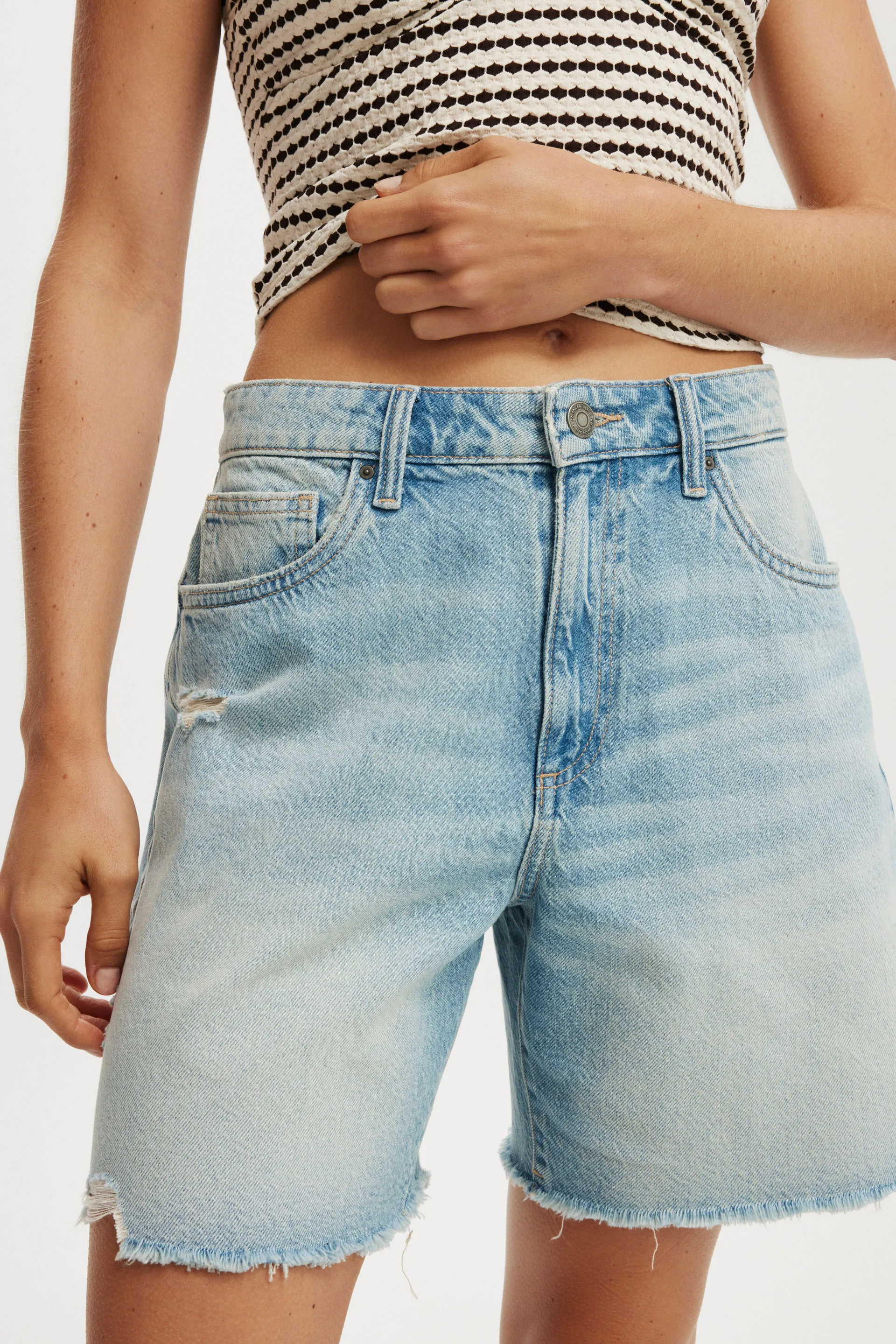 710-relaxed-denim-short-sunfaded-blue-rip-1.jpg