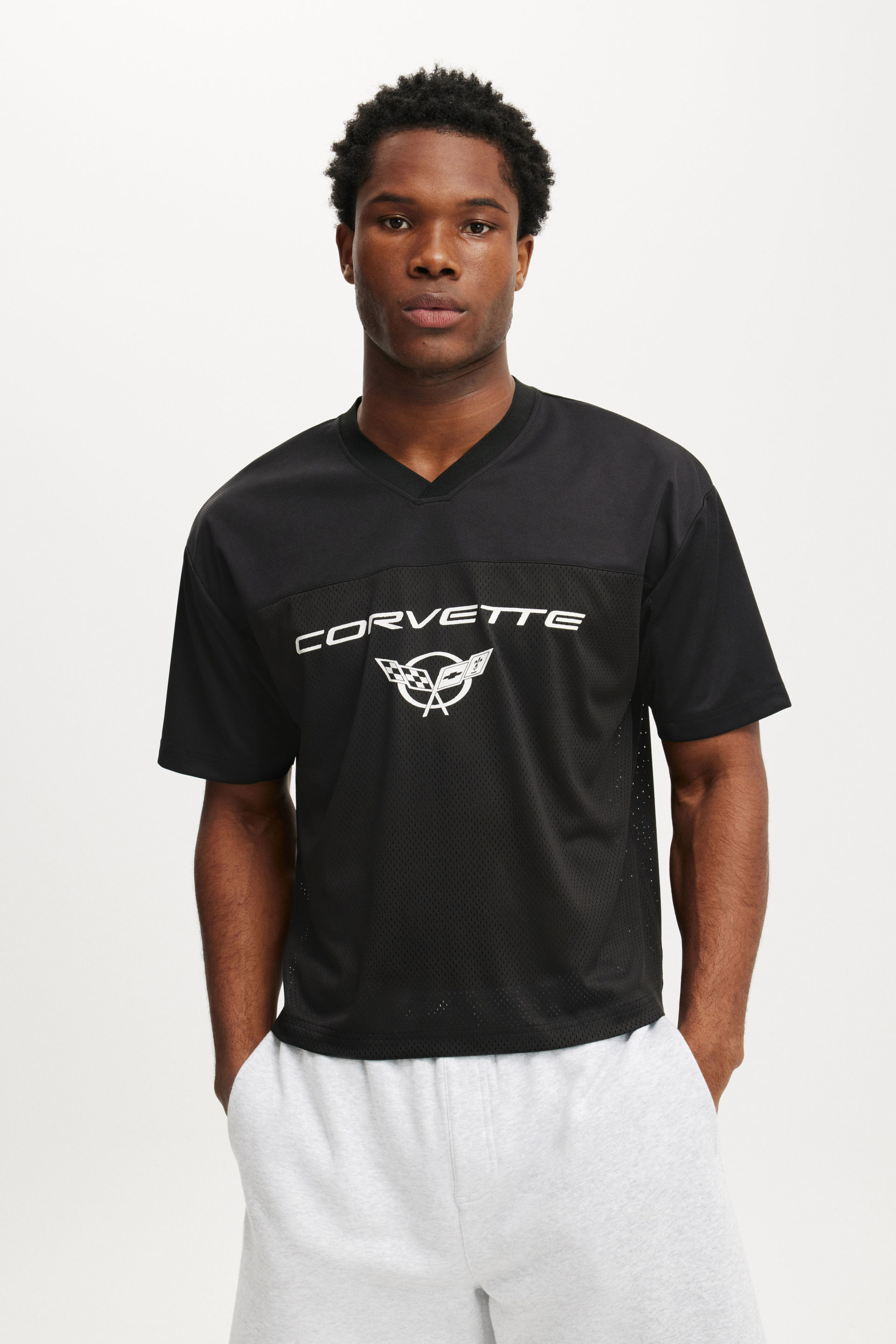 8638-general-motors-crew-neck-football-jersey-lcn-gm-black-gm-corvette-stars-1.jpg