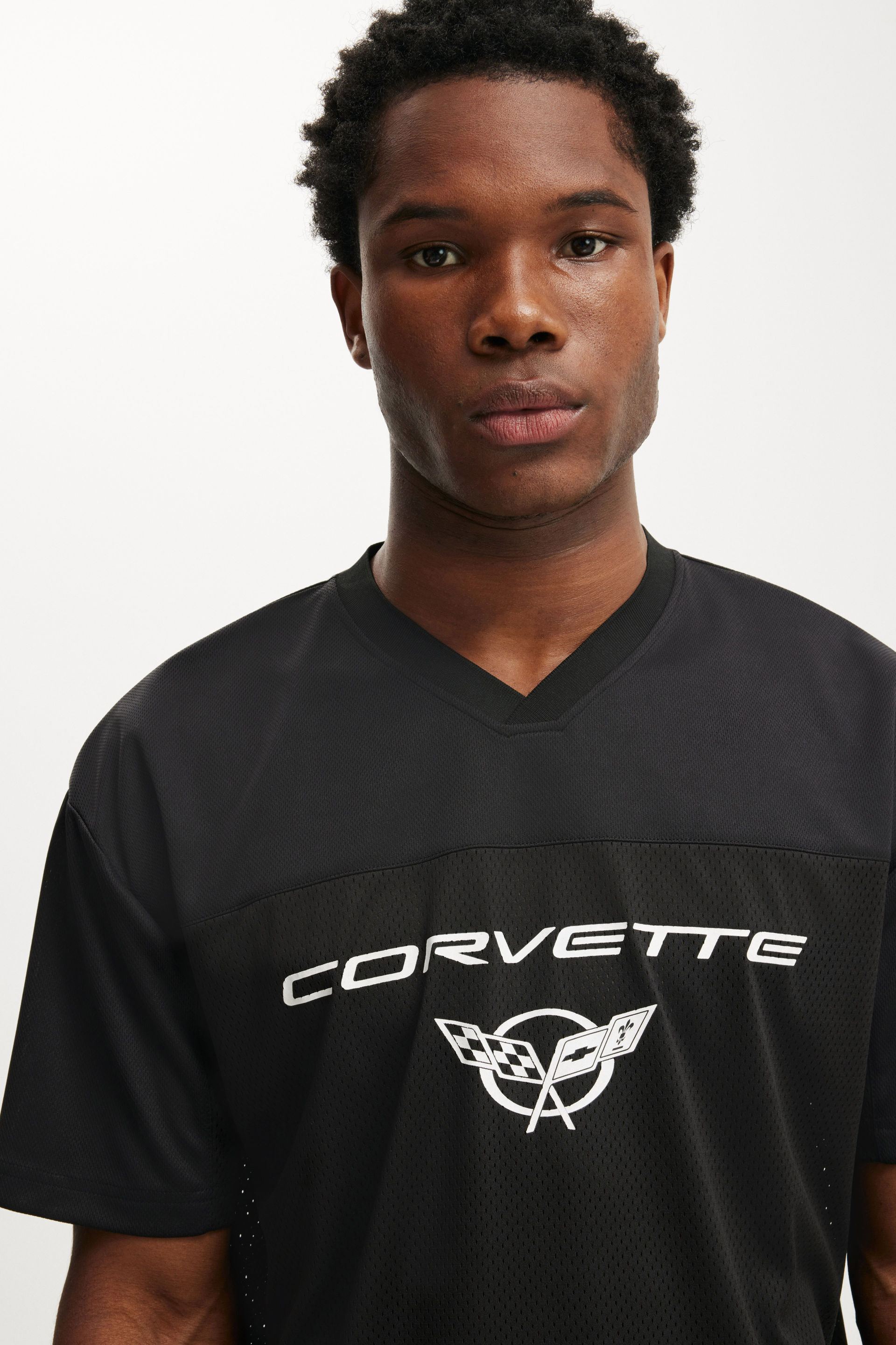 8638-general-motors-crew-neck-football-jersey-lcn-gm-black-gm-corvette-stars-1.jpg